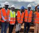 Obunji Group Operations Directors (2nd-L), HSE Manager (3rd-R) pause for a group photo with Bulamaba Miners