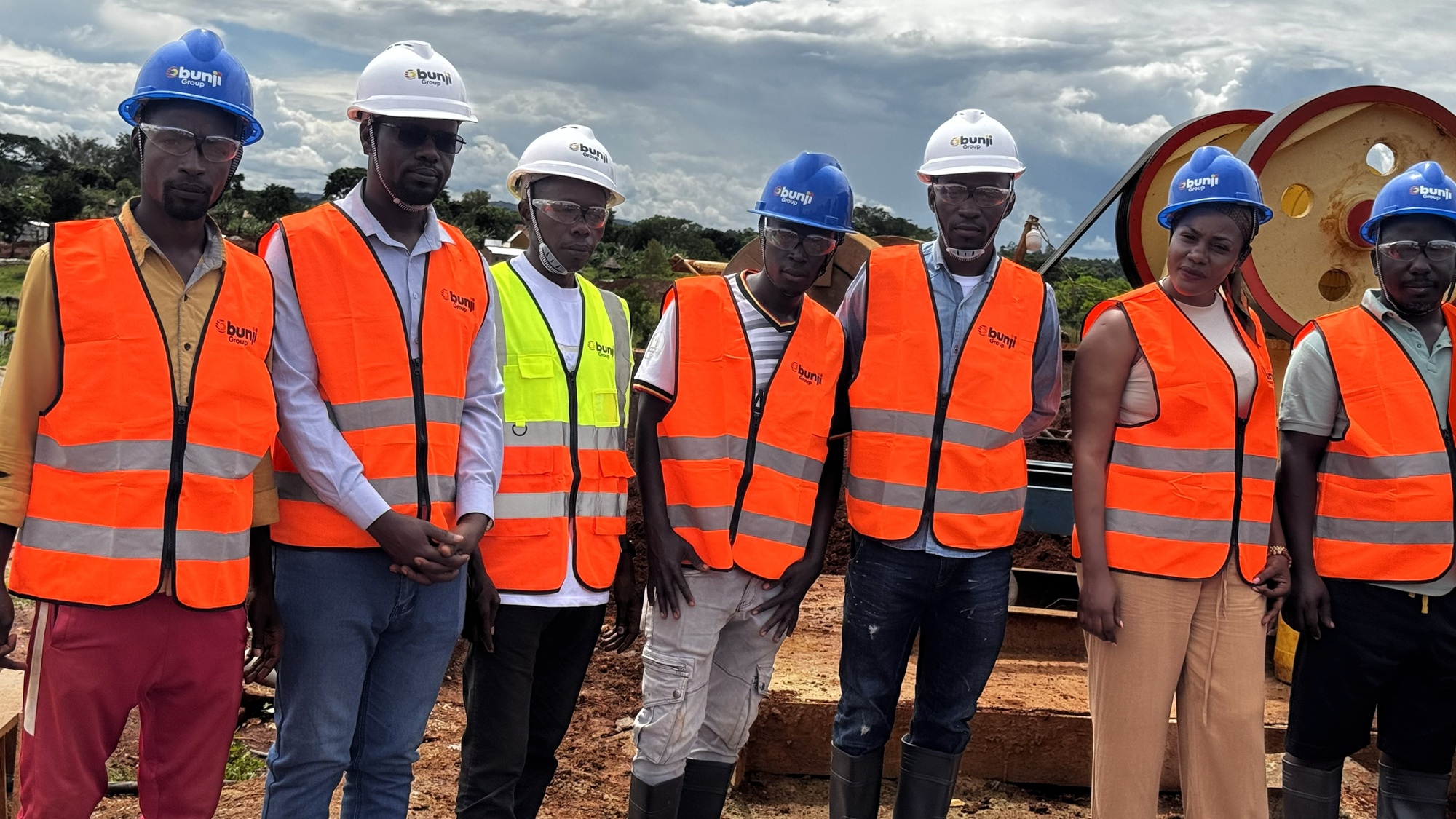 Obunji Group Operations Directors (2nd-L), HSE Manager (3rd-R) pause for a group photo with Bulamaba Miners